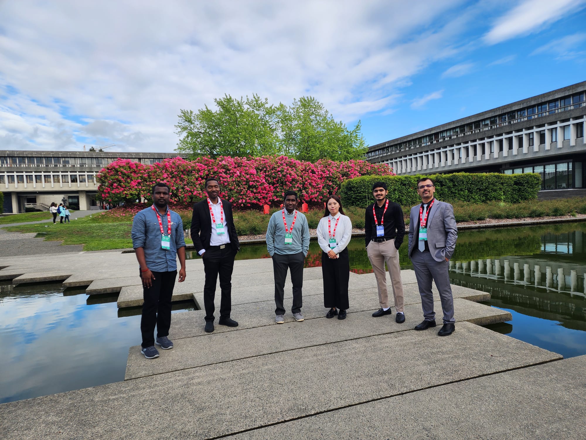 CAN AI/CRV 2026 - Team Photo with Conference Banner